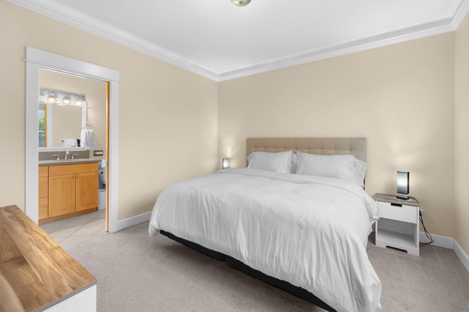 Main-floor primary bedroom with king bed